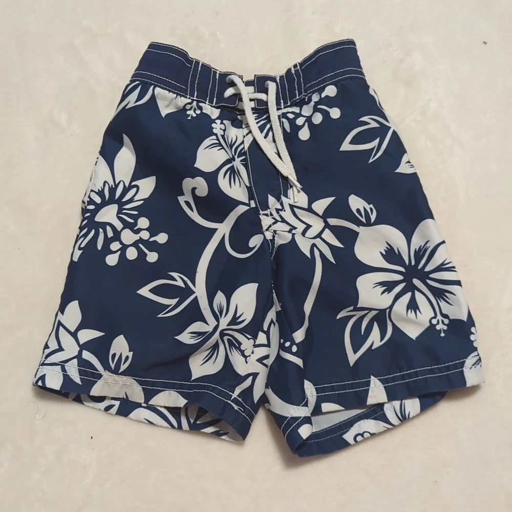 Old Navy boys Navy Blue And WhiteHawaiian Flowers Print Size 2T swim trunks